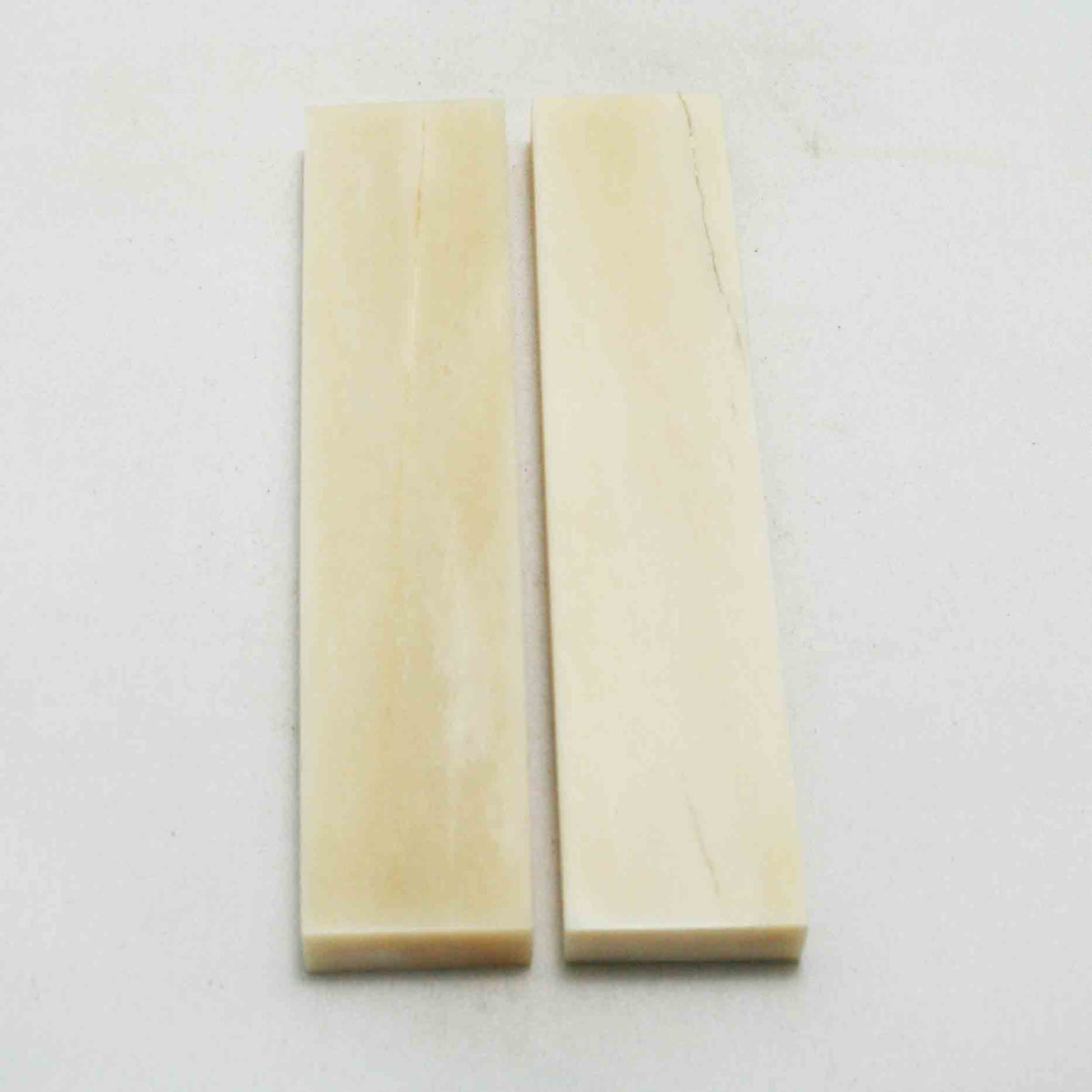 NB103NA89 Giraffe Bone Scales Size: 5.25" x 1.13" x 0.39" inch