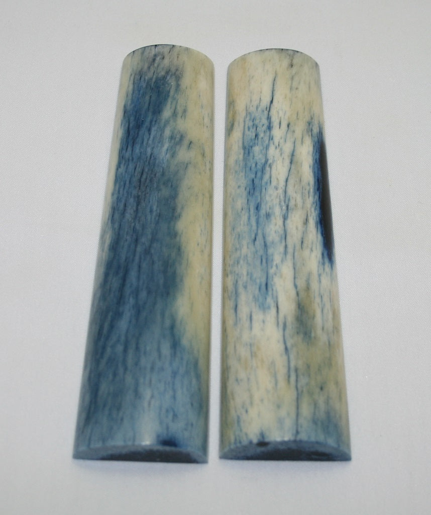 NB104AY54  Giraffe Bone Scales